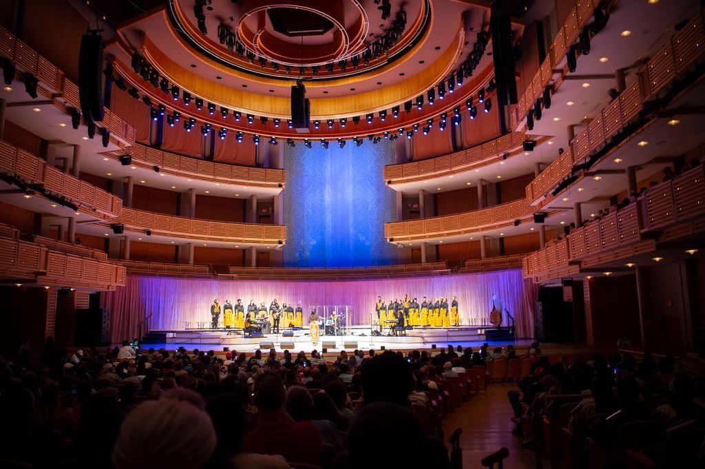 Lisa Knowles Smith and The Brown Singers onstage at the Arsht Center 