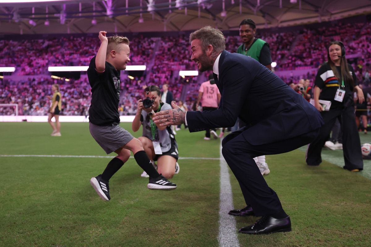 Sir David Beckham, of co-owner of Inter Miami, greets player escort prior to the MLS match