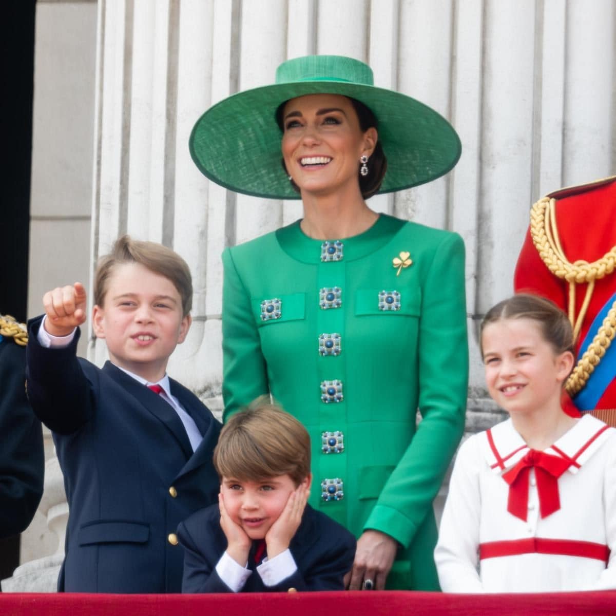 The little Prince appeared to cover his ears during the balcony appearance.