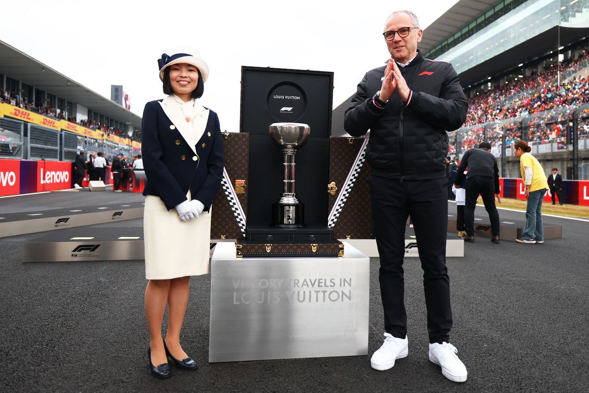  Princess Akiko of Mikasa and Stefano Domenicali, CEO of the Formula One Group with the trophy on the grid during the F1 Grand Prix of Japan