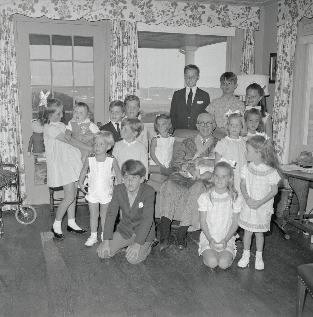 Christopher Kennedy, Ted Kennedy, Jr., Christopher Lawford, Sydney Lawford, Robin Lawford, Courtney Kennedy, Timmy Shriver, William Smith, Kara Kennedy, Mr. Kennedy holding Mark Shriver, Victoria Lawford, Mary Kerry Kennedy, Michael Kennedy, Stephen Smith, Joseph P. Kennedy II, Robert Shriver and Maria Shriver.