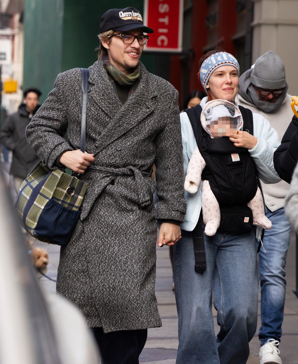 Millie Bobby Brown and husband Jake Bongiovi are spotted enjoying a day Christmas shopping with their daughter in New York City.