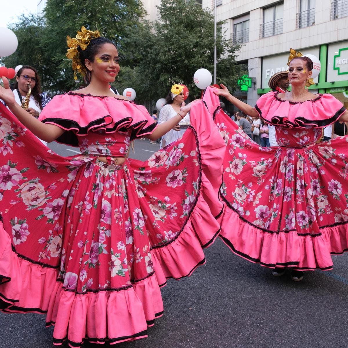 Women wearing costumes of people of Latin American origin