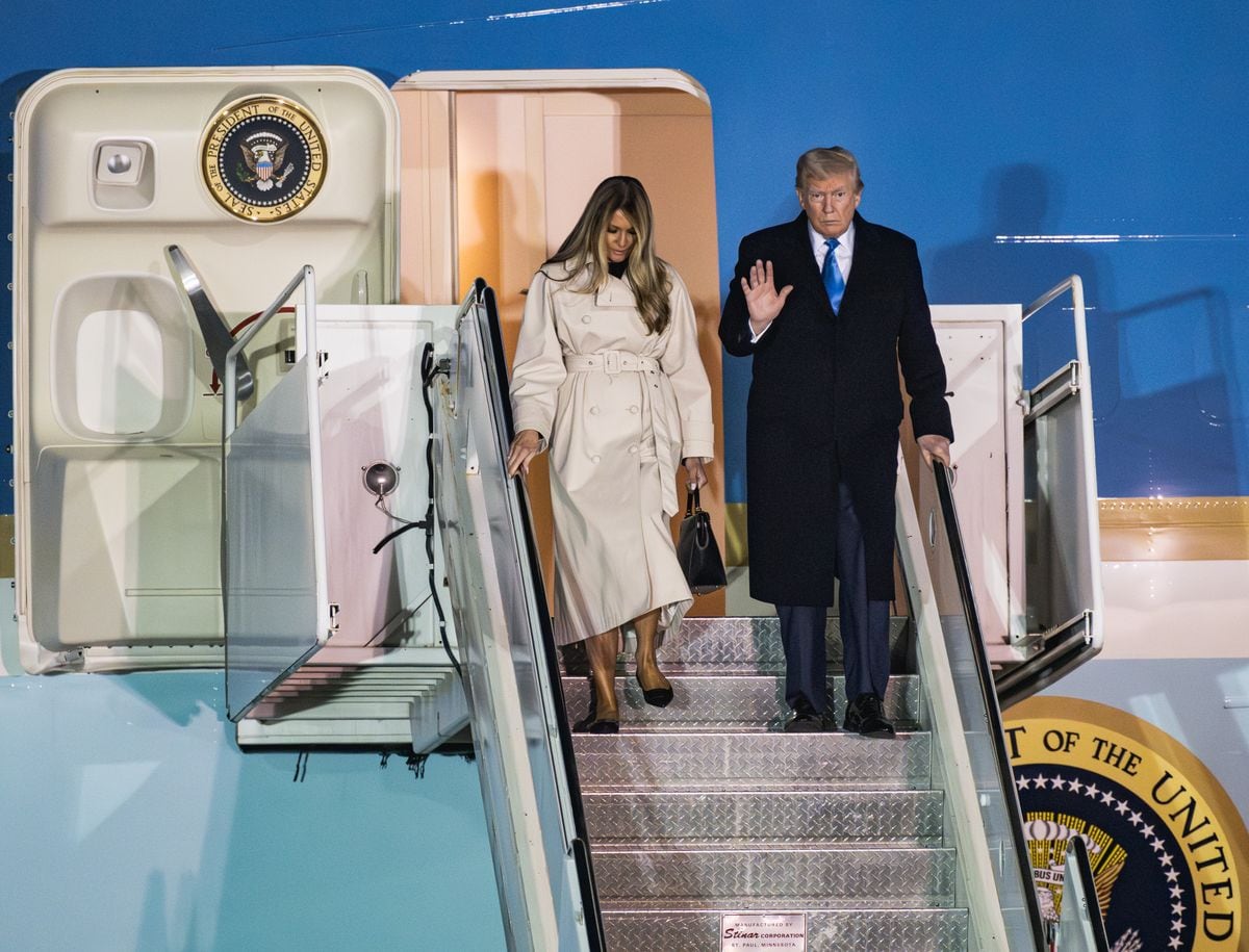 U.S. President Donald Trump and first Lady Melania Trump steps off Air Force One upon arrival at the at Fiumicino Airport on April 25, 2025 in Rome, Italy.
