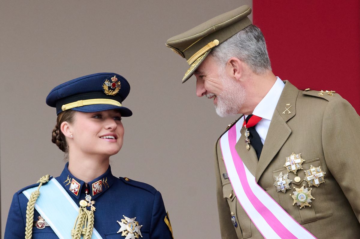 The King and Princess Leonor share a candid conversation during Armed Forces Day celebrations in Vigo.