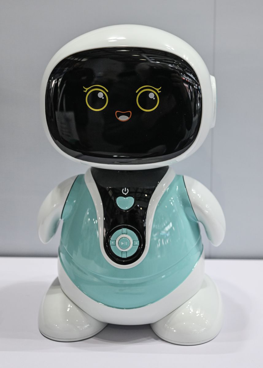 A humanoid robot with a friendly cartoon face is displayed at the Appliance and Electronics World Expo 2026 (AWE2026)