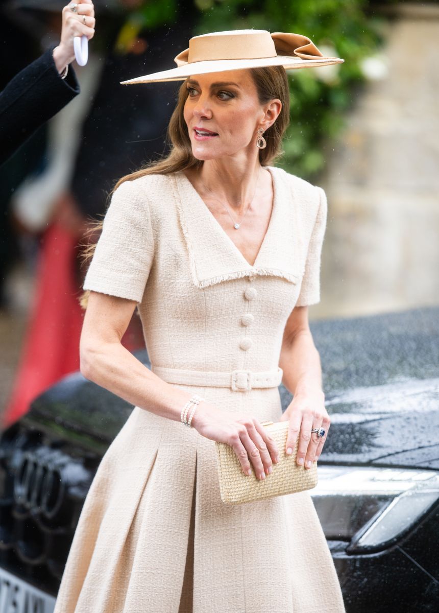 Kate's wide-brim hat paid tribute to one of Britain's most enduring wedding traditions, where statement headpieces remain a hallmark of royal celebrations.