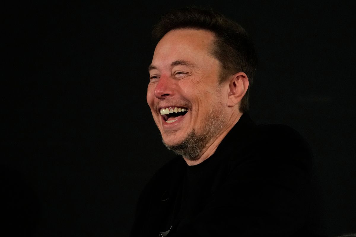 Tesla and SpaceX's CEO Elon Musk smiles 