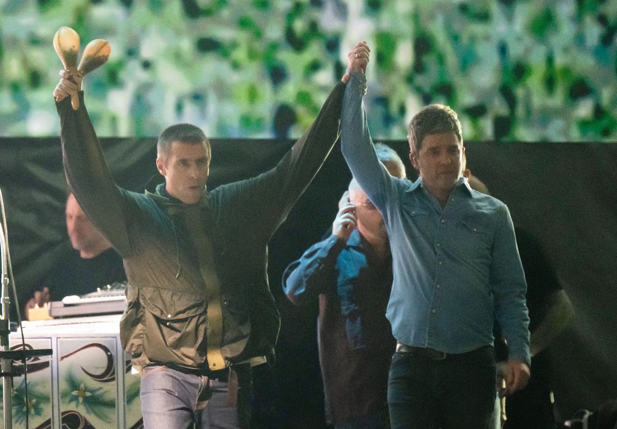  Liam Gallagher and Noel Gallagher of Oasis perform during the opening night of their Live 25' Tour at Principality Stadium on July 04, 2025 in Cardiff, Wales