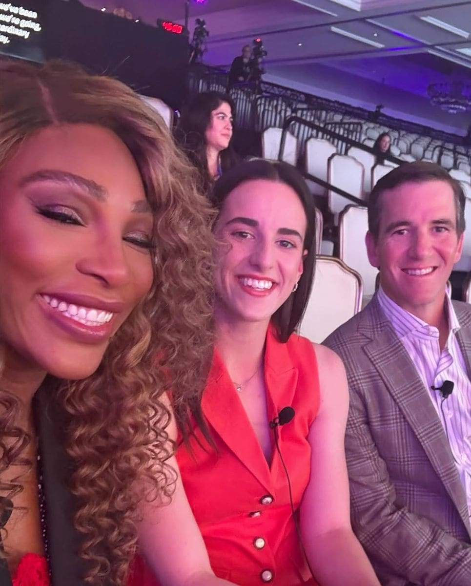 Serena Williams poses with Caitlin Clark and Eli Manning