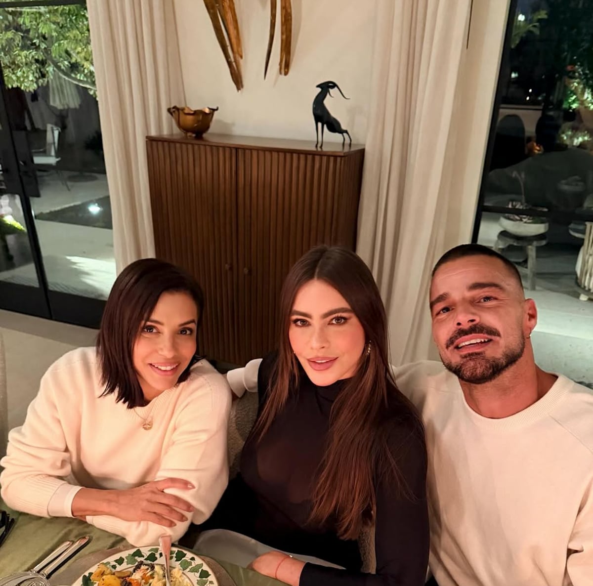 Ricky Martin and Eva Longoria coordinated in all-white ensembles, delivering a picture-perfect moment of star-studded style