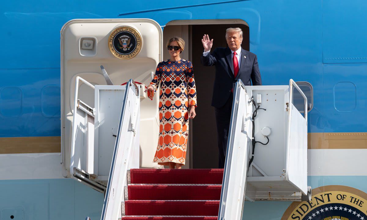 The former first lady arrived in Florida wearing a colorful Gucci dress
