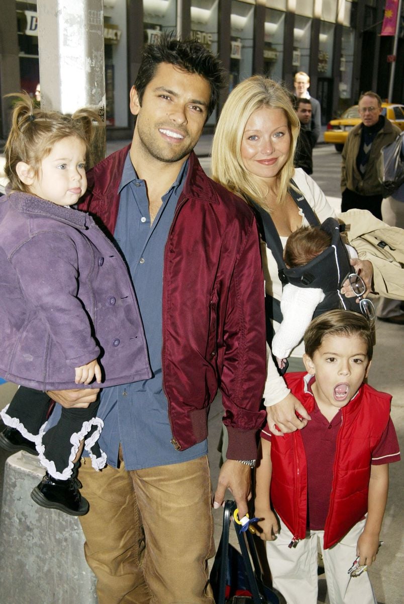  Lola and Mark Consuelos with wife Kelly Ripa and sons Joaquin and Michael arrive at the Opening Night for "A Year With Frog and Toad" at The Cort Theatre April13, 2003 in New York. (Photo by Bruce Glikas/Getty Images)