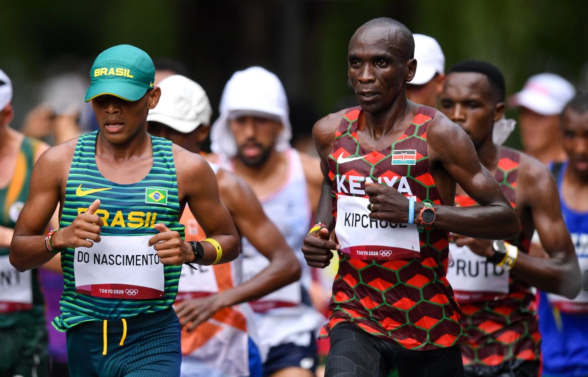Daniel Do Nascimento of Brazil, left, during the men's marathon at Sapporo Odori Park on day 16 during the 2020 Tokyo Summer Olympic Games