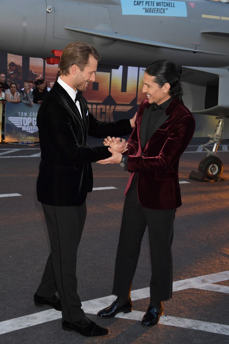 Glen Powell (L) and Danny Ramirez at the Royal Film Performance screening of "Top Gun: Maverick" in London.