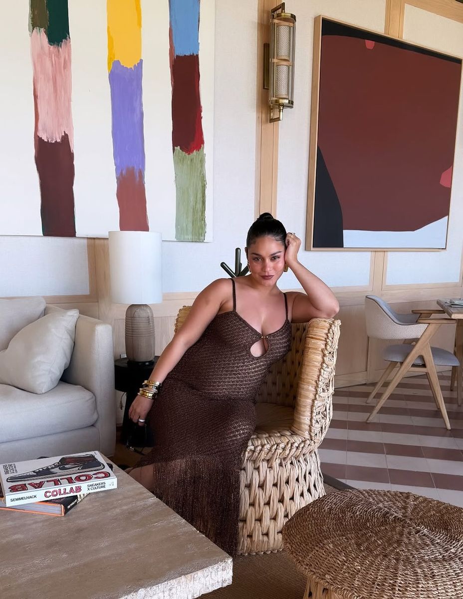 Vanessa Hudgens bares her baby bump in a sheer maternity dress