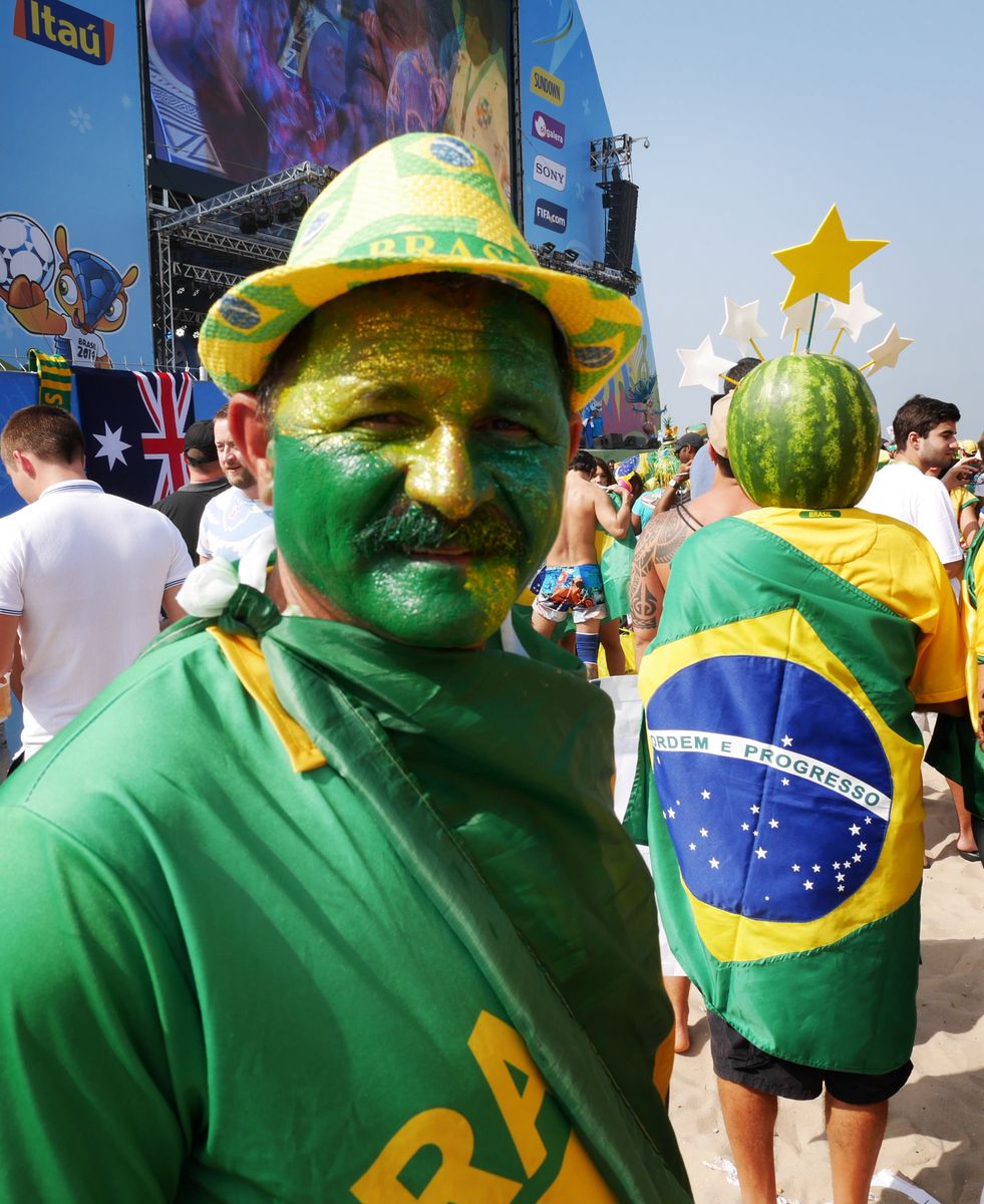 In Brazil, drums and samba rhythms take over the streets near stadiums and fan parks.