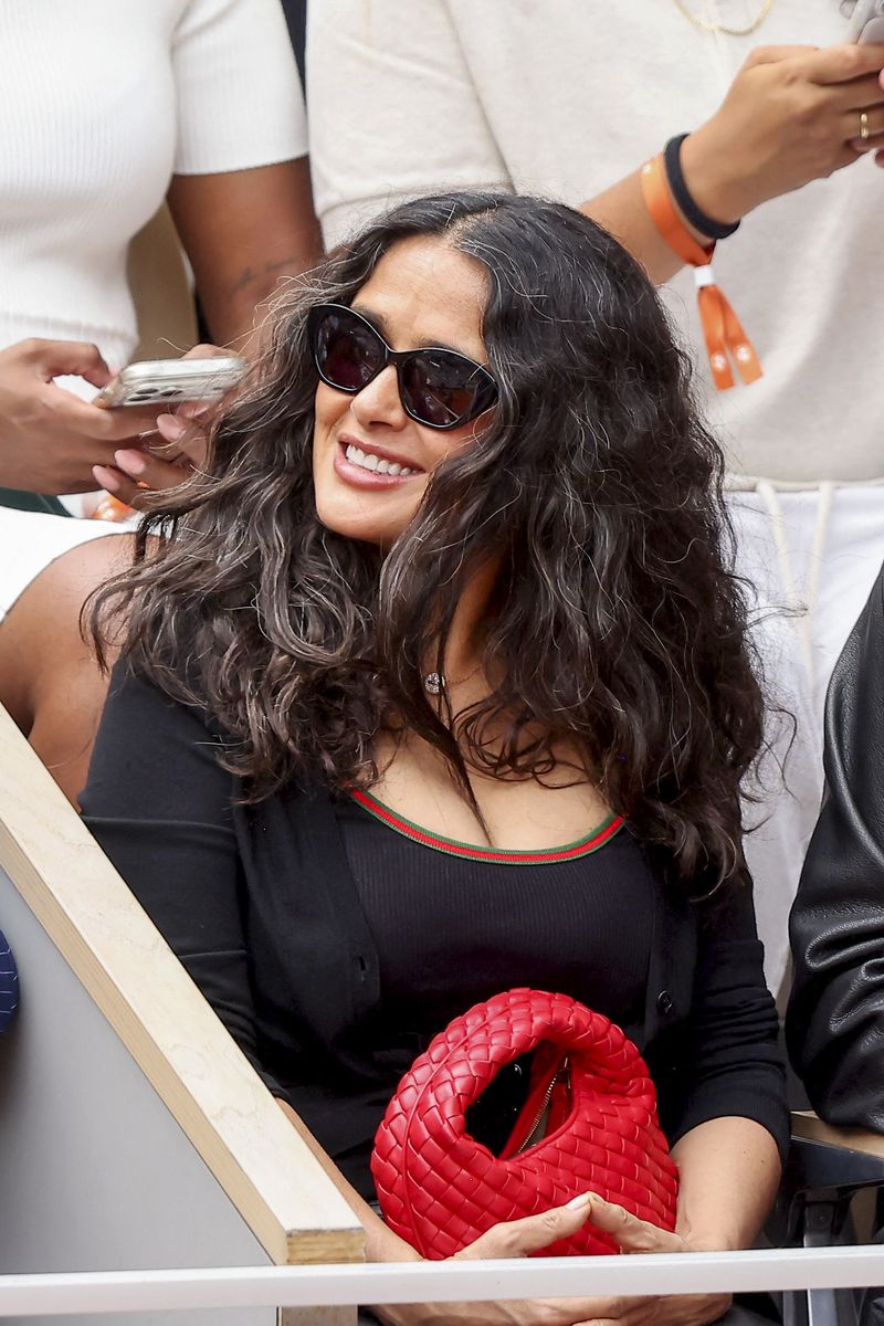 Salma Hayek and her husband, François-Henri Pinault, are spotted in the stands during the 2026 French Open at Roland Garros Stadium.