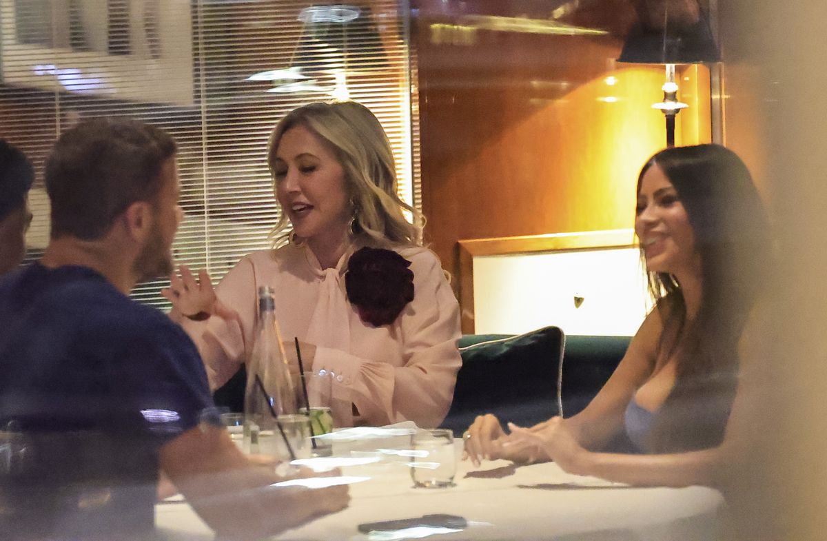 The actress and the Imagine Dragons singer chat during an evening out with friends.