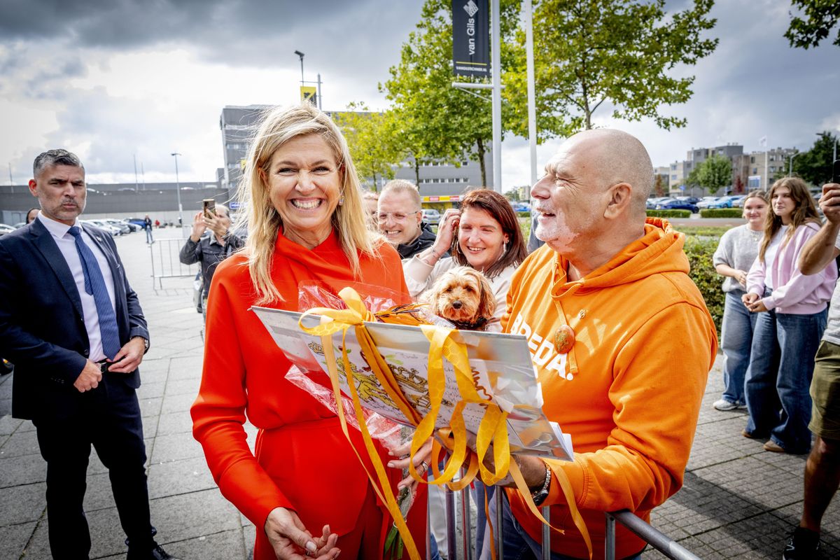 Máxima was all smiles as she greeted people gathered outside the stadium following the engagement.