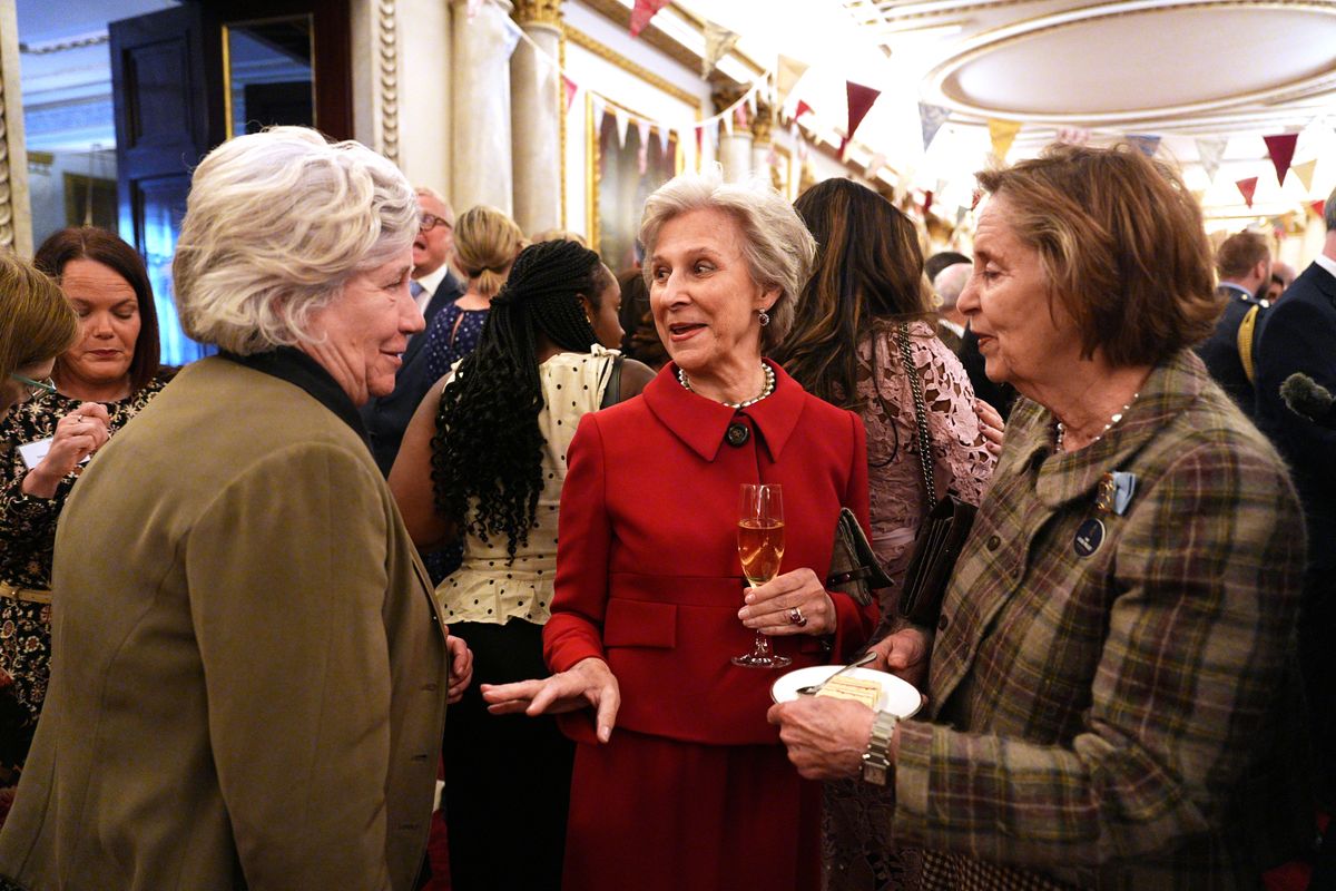 Birgitte, Duchess of Gloucester (C) attends a reception at Buckingham Palace. 