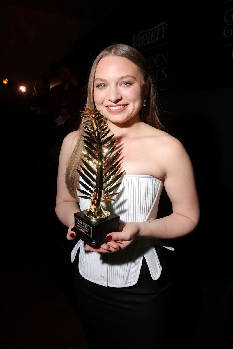 Mia Threapleton accepts an award during the Variety and Golden Globes Breakthrough Artists Party at Cannes Film Festival on May 17, 2025 in Cannes, France.