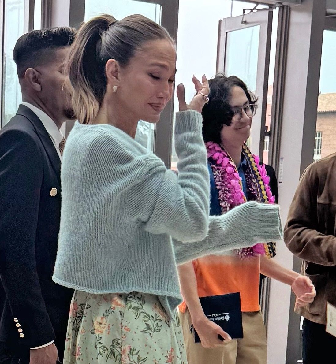 Jennifer Lopez wiped away tears as she watched her son Max graduate high school.