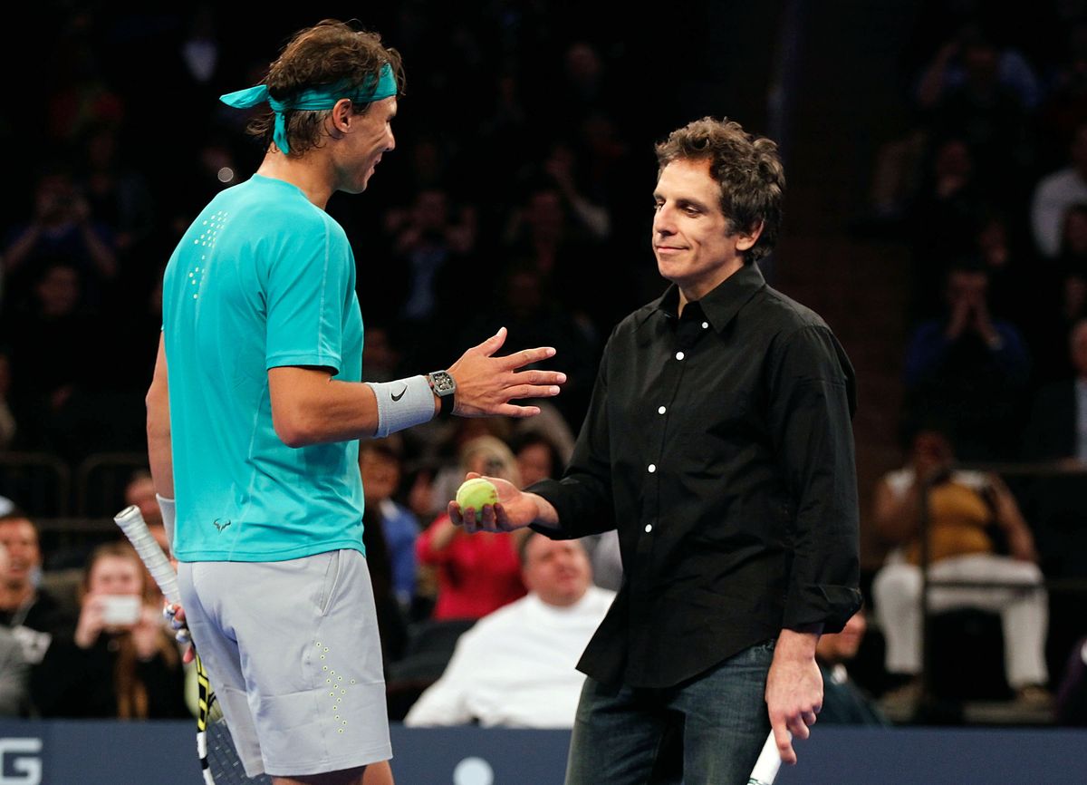 Ben Stiller comes out to play with Rafael Nadal in the second set against Juan del Potro of Argentina during the BNP Paribas Showdown at Madison Square Garden on March 4, 2013