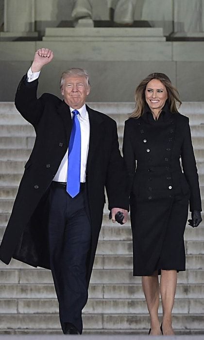 The first lady paid homage to American military service members donning a coat by designer Norisol Ferrari, whose father is a wounded veteran.
Photo: MANDEL NGAN/AFP/Getty Images