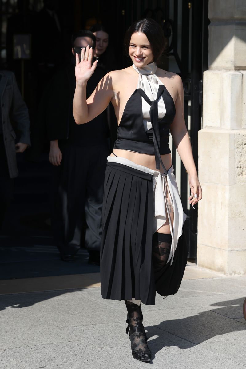 Rosalia wore a black-and-off-white halter top that plays with illusion and structure, featuring layers to create the effect of a plunging neckline. 
