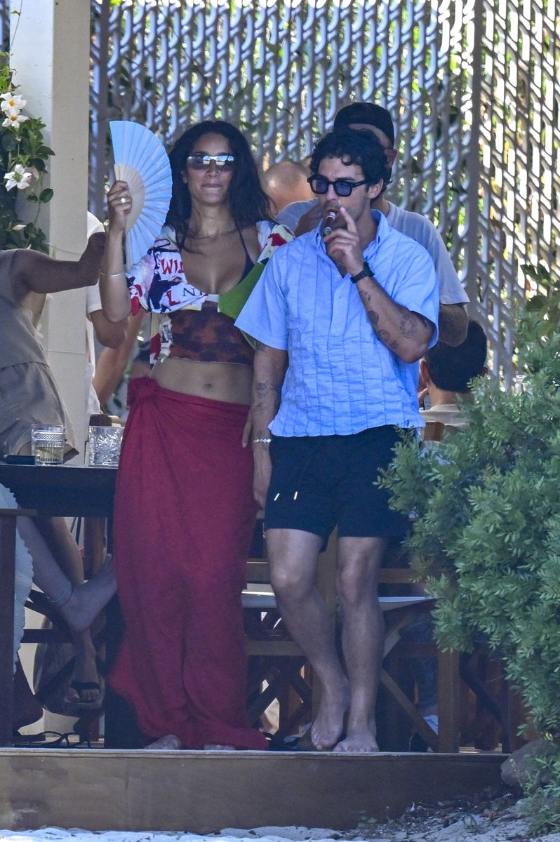 Photos captured Gabriela dancing with her arms raised while Jonas applauded beside her, suggesting the afternoon had evolved into a lively social celebration.