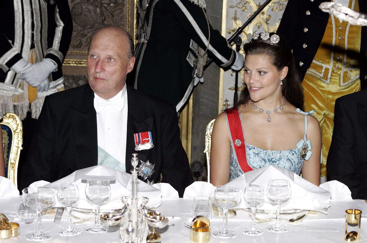 King Harald and Crown Prince Victoria at a gala dinner hosted at the Royal Palace in Stockholm