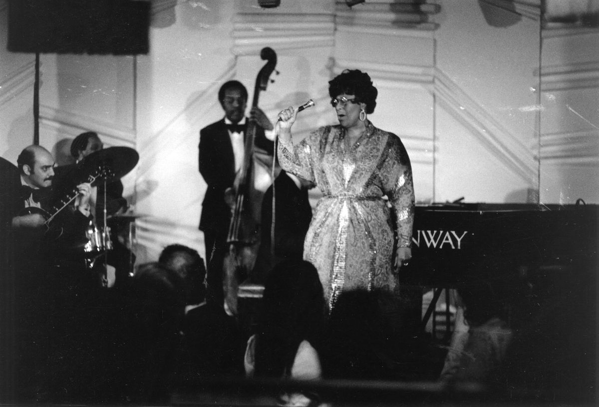 Ella Fitzgerald performs at Ronnie Scott’s Jazz Club in London on April 2, 1974, joined by legendary jazz guitarist Joe Pass.