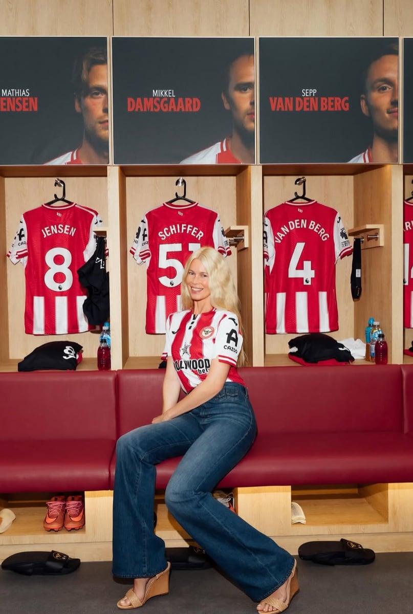 Claudia was spotted in a Brentford football shirt, showing her love for husband Sir Matthew Vaughn