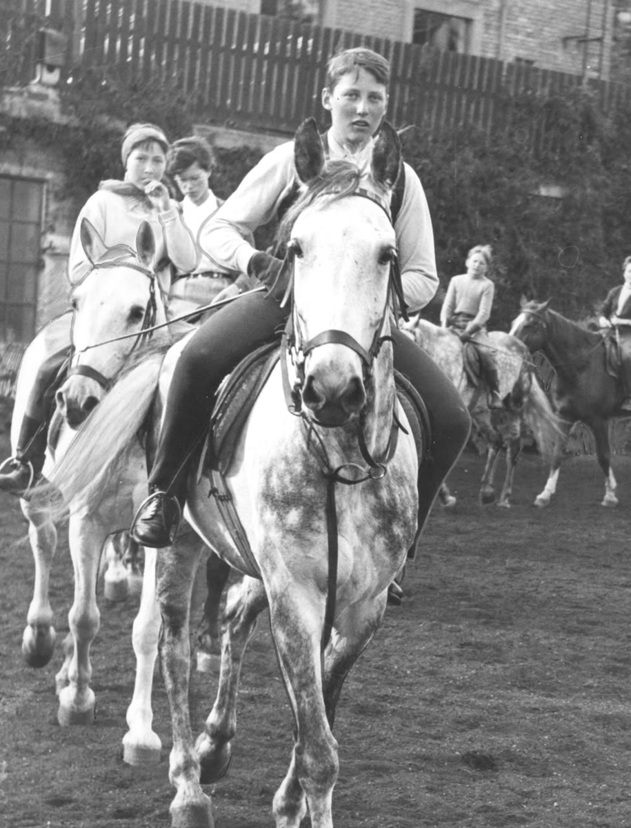 Young Prince Harald rides at the Skøyen riding school in 1952.