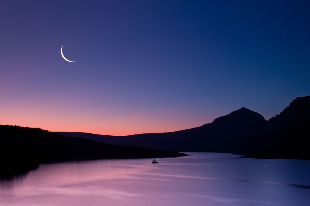 This beautiful, bright crescent moon shows the glow of dawn approaching.