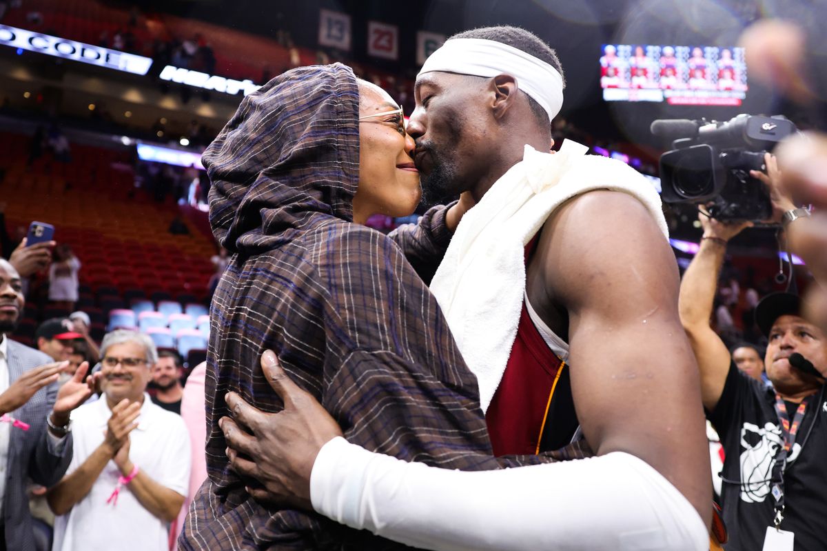  A'ja Wilson celebrates with Bam Adebayo after the Miami Heat's win over the Washington Wizards on March 10