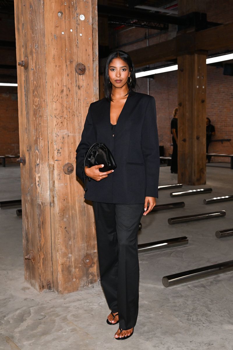 Natalia Bryant showcased her sophisticated NYFW style in oversized black tailoring at Calvin Klein after making appearances at several shows throughout the week.