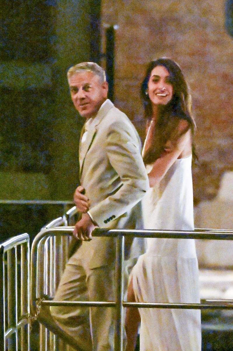 Amal and George Clooney looked straight out of a romantic movie as they stepped out for dinner in Venice.