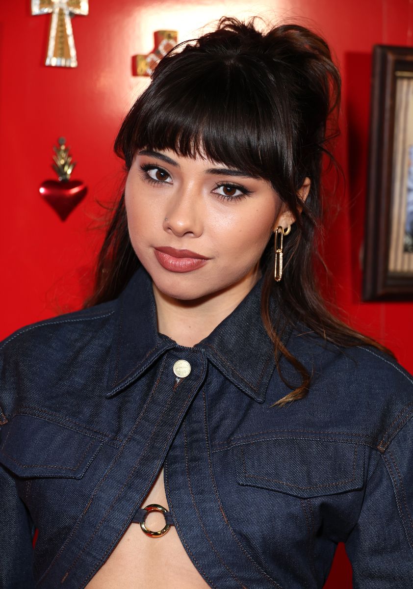 Xochitl Gomez voices Gabby, Sebastian's older sister and one of the two children assigned to the Cat for his unusual new mission.