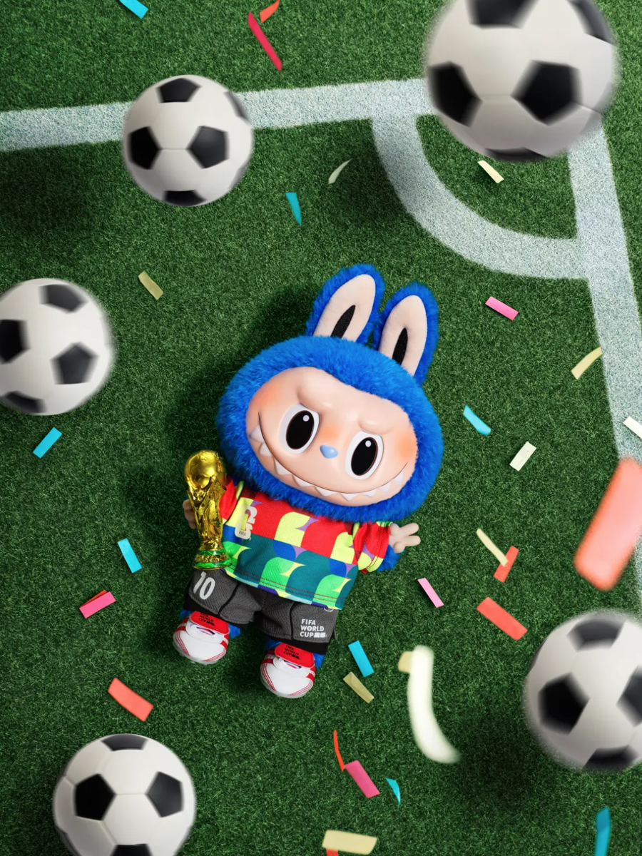 The new collection reimagines the collectible as a football-loving hero, dressed in a blue World Cup-inspired kit complete with miniature boots and tournament-themed accessories.