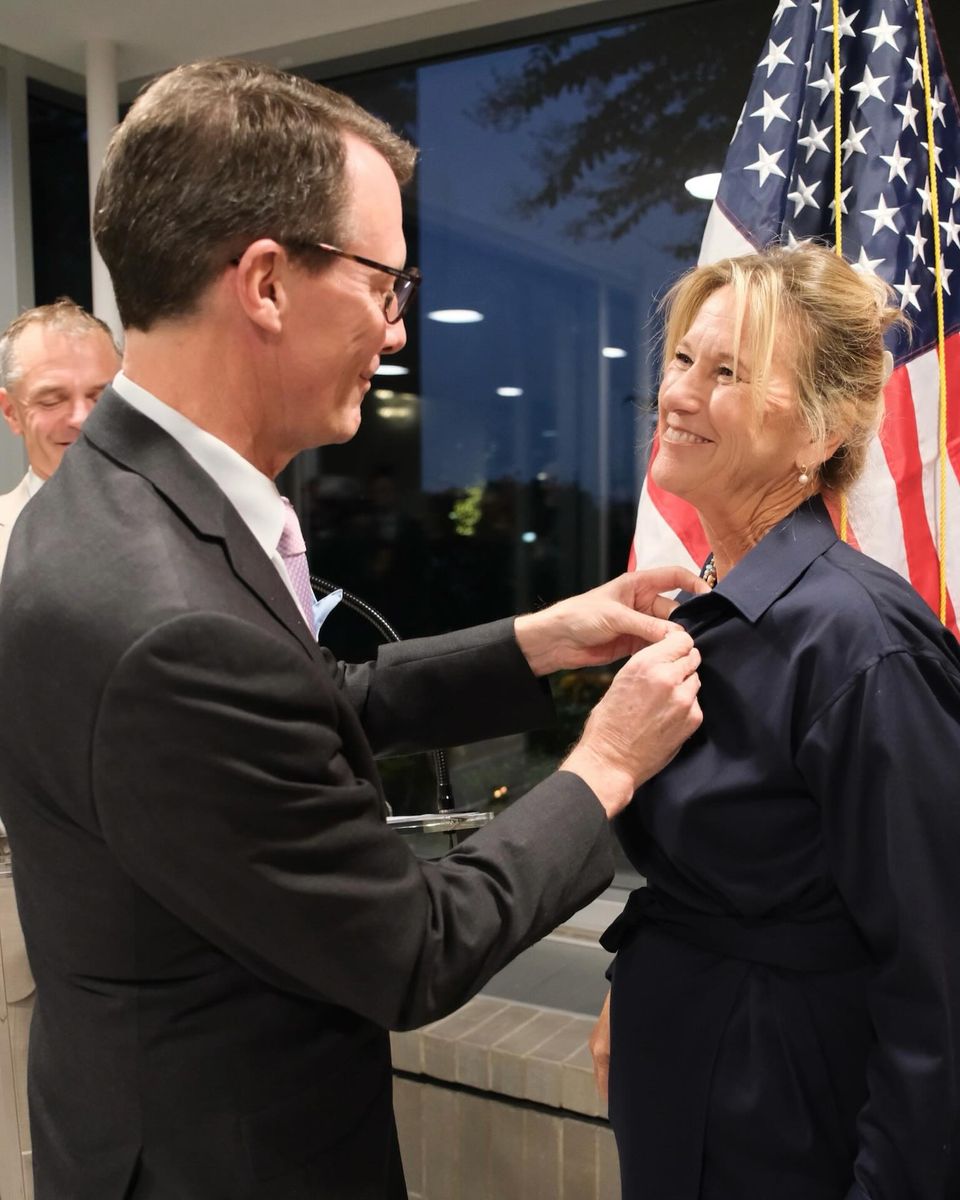 Prince Joachim presented a knight’s cross to one of three honorary consuls recognized during the reception at the Danish Embassy.