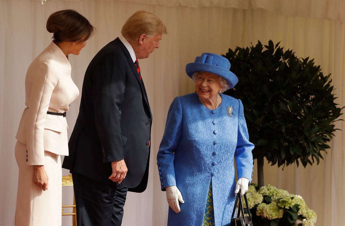 The couple pictured with the Queen at Windsor Castle in 2018