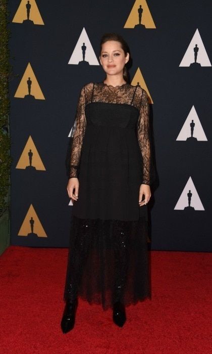 The pregnant actress also praised his French speaking skills.
Photo: Valerie Macon/Getty Images