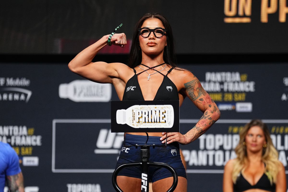 Tracy Cortez poses on the scale during the UFC 317 ceremonial weigh-in at T-Mobile Arena on June 27, 2025 in Las Vegas, Nevada. 