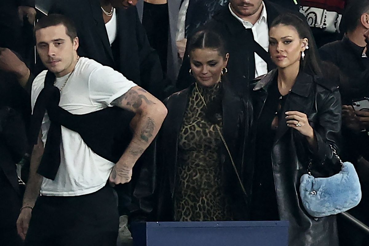 US singer and actress Selena Gomez (C) leaves with Brooklyn Beckham (L) ad his wife Nicola Peltz Beckham after attending the French L1 football match between Paris Saint-Germain (PSG) and Olympique de Marseille (OM) at The Parc des Princes Stadium in Paris on September 24, 2023. (Photo by FRANCK FIFE / AFP) (Photo by FRANCK FIFE/AFP via Getty Images)