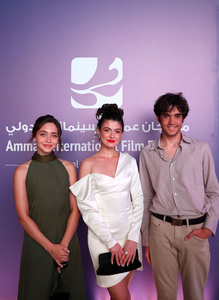 Princess Jalila bint Ali and her brother Abdullah with Jordanian actress Tara Abboud at the opening ceremony of the 5th edition of the Amman International Film Festival