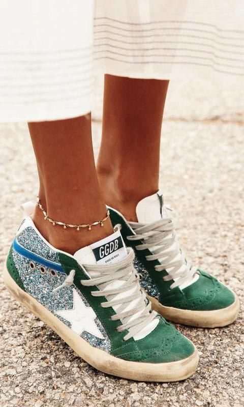 Julie Sarinana wears green in her Golden Goose sneakers