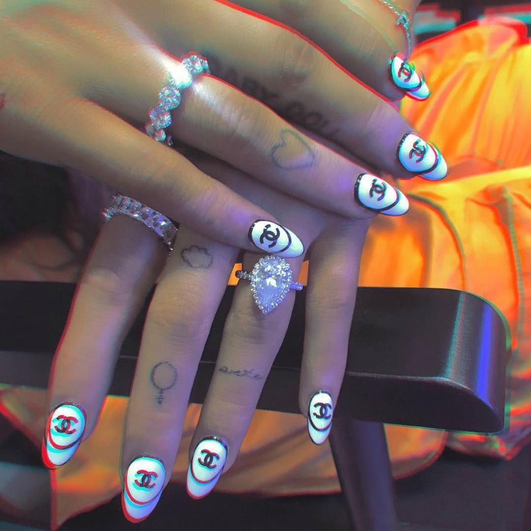 Ariana Grande manicure Channel logo.