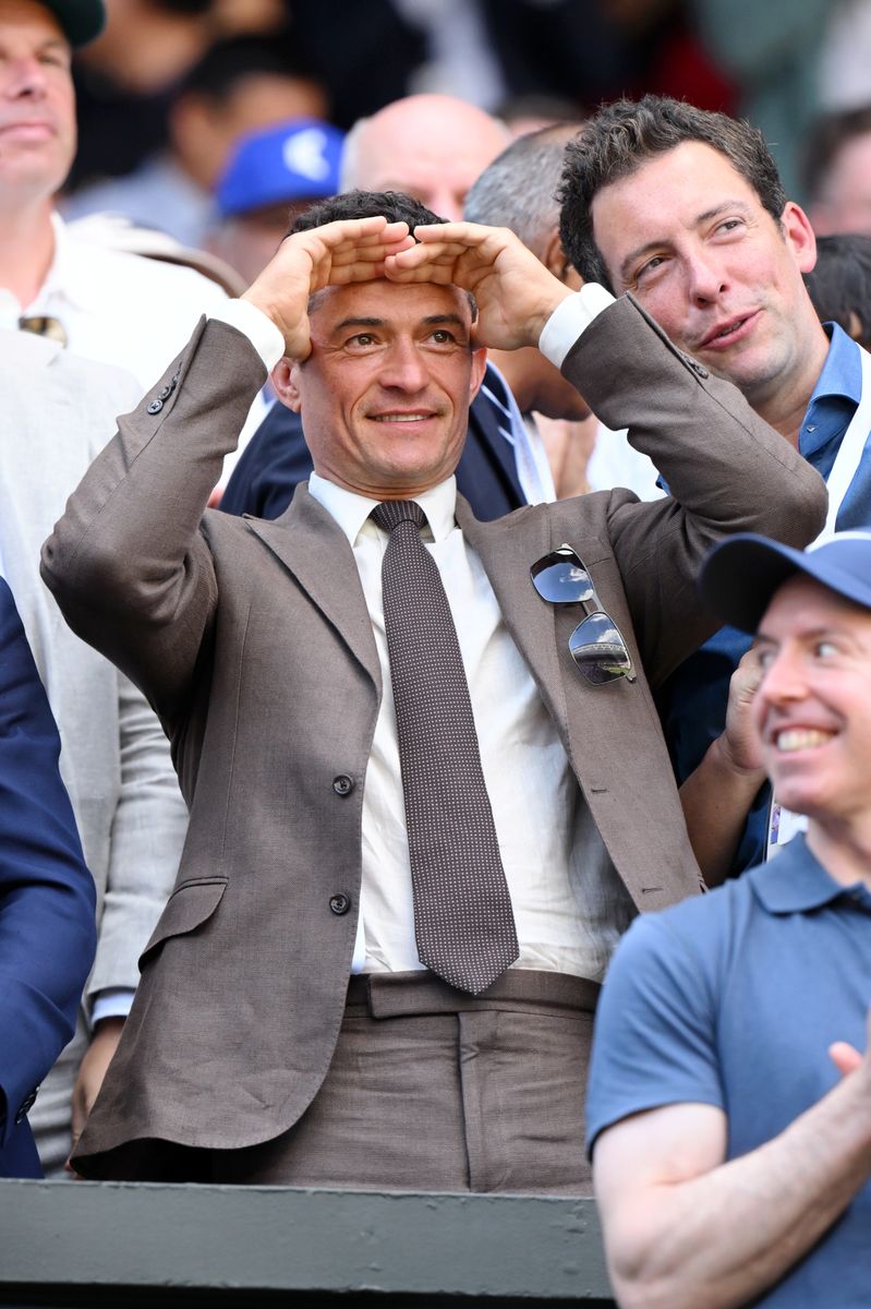 Orlando Bloom, wearing Ralph Lauren, attends day fourteen of the Wimbledon Tennis Championships at the All England Trennis and Croquet Club at on July 13, 2025 in London, England. (Photo by Karwai Tang/Getty Images for Ralph Lauren)